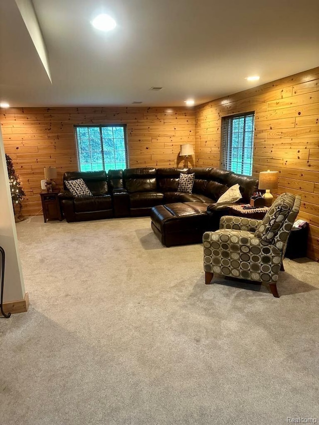 3217 Autumn View Ln, Metamora, MI 48455 - living area featuring wooden walls and carpet flooring