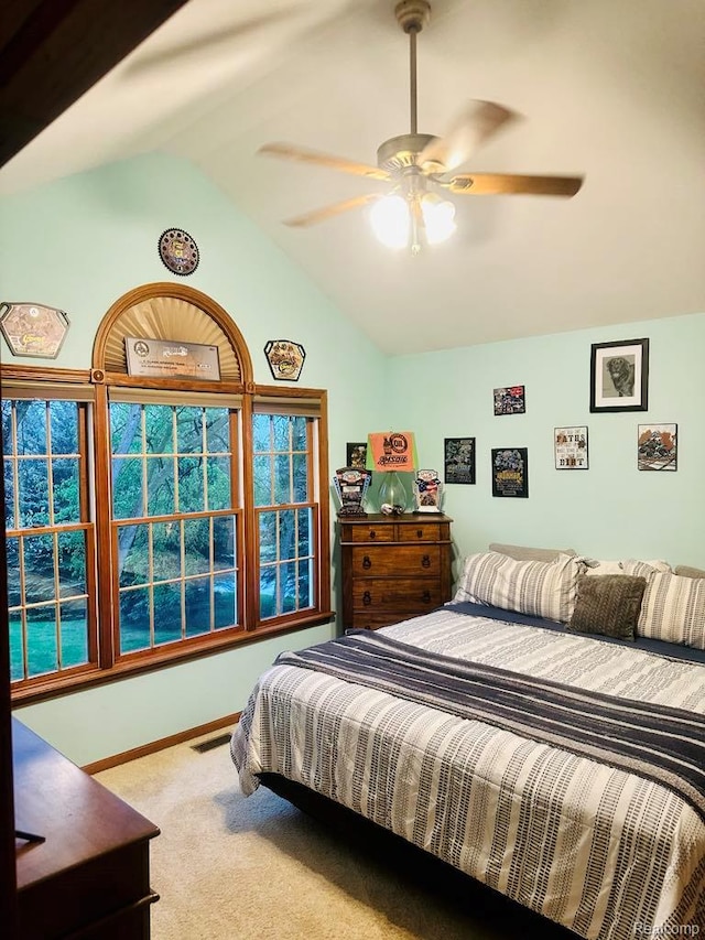 3217 Autumn View Ln, Metamora, MI 48455 - carpeted bedroom with lofted ceiling, ceiling fan, and baseboards