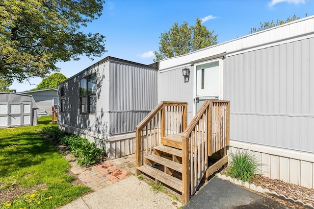 351 N Squirrel Rd, Auburn Hills, MI 48326 - property entrance featuring a lawn