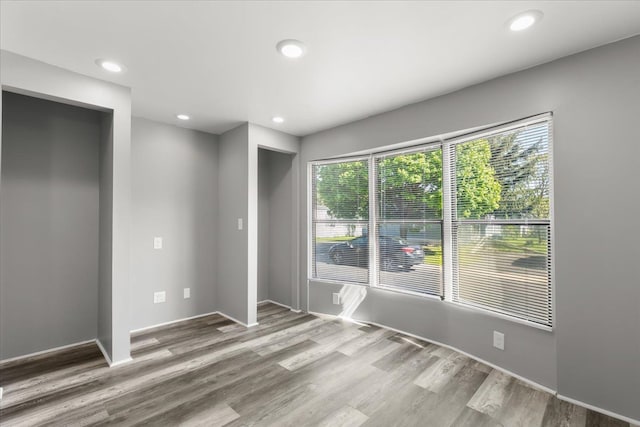 351 N Squirrel Rd, Auburn Hills, MI 48326 - empty room featuring wood finished floors, recessed lighting, and baseboards