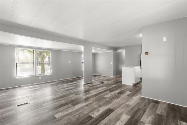351 N Squirrel Rd, Auburn Hills, MI 48326 - unfurnished living room with dark wood-type flooring