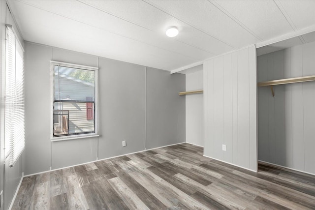 351 N Squirrel Rd, Auburn Hills, MI 48326 - unfurnished bedroom featuring wood finished floors and a closet