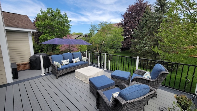 6192 N Shore Dr, West Bloomfield, MI 48324 - wooden deck with outdoor lounge area, grilling area, and a yard
