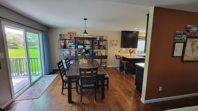 6192 N Shore Dr, West Bloomfield, MI 48324 - dining area with wood finished floors and baseboards