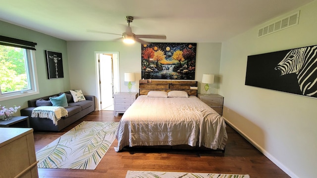 6192 N Shore Dr, West Bloomfield, MI 48324 - bedroom with wood finished floors and a ceiling fan