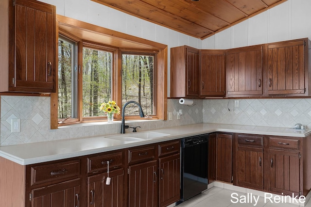 16972 James Dr, Big Rapids, MI 49307 - kitchen featuring dishwasher, a sink, light countertops, wooden ceiling, and lofted ceiling
