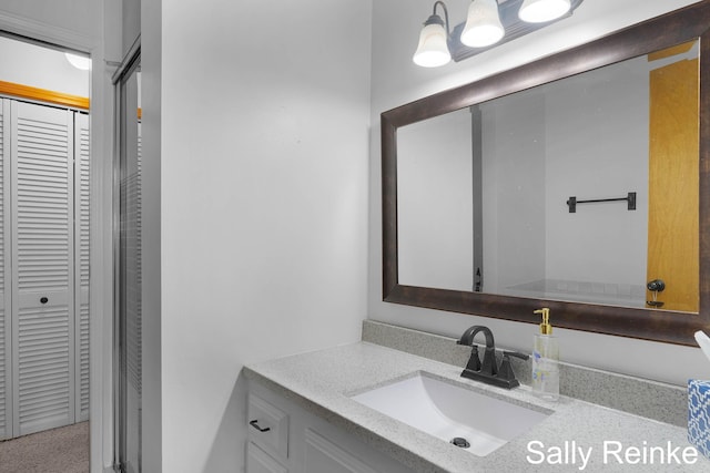 16972 James Dr, Big Rapids, MI 49307 - bathroom with vanity and a closet