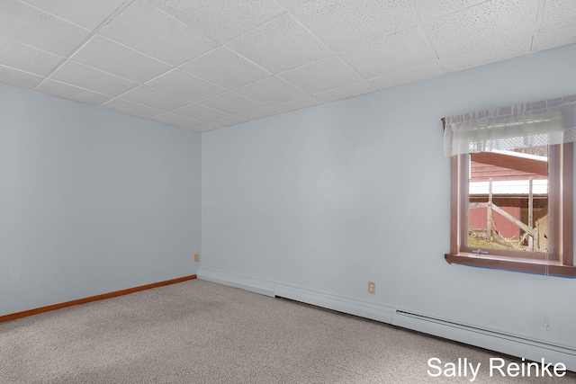 16972 James Dr, Big Rapids, MI 49307 - carpeted empty room featuring a drop ceiling and baseboards