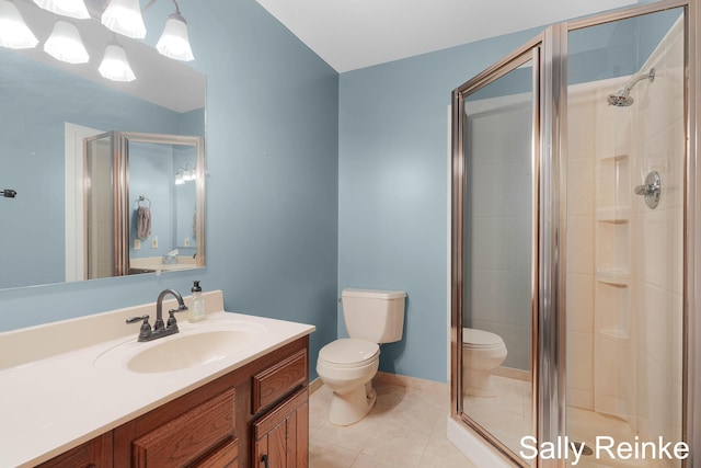 16972 James Dr, Big Rapids, MI 49307 - full bath with toilet, a shower stall, tile patterned floors, and vanity