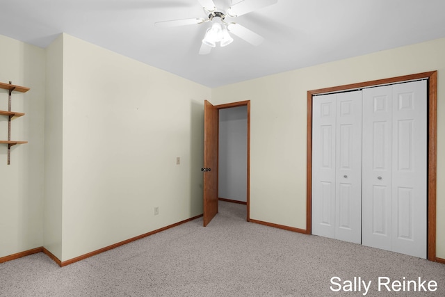 16972 James Dr, Big Rapids, MI 49307 - unfurnished bedroom with light colored carpet, baseboards, a closet, and a ceiling fan