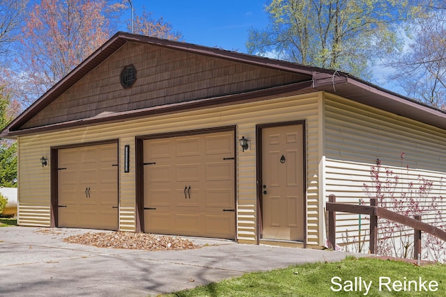 16972 James Dr, Big Rapids, MI 49307 - garage featuring asphalt driveway