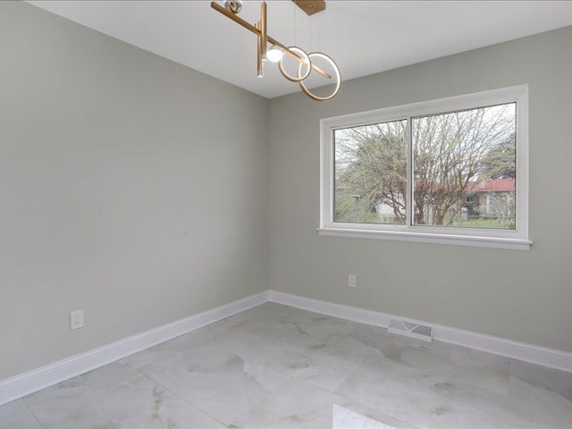 37305 Maas Dr, Sterling Heights, MI 48312 - unfurnished room featuring a chandelier, baseboards, and healthy amount of natural light