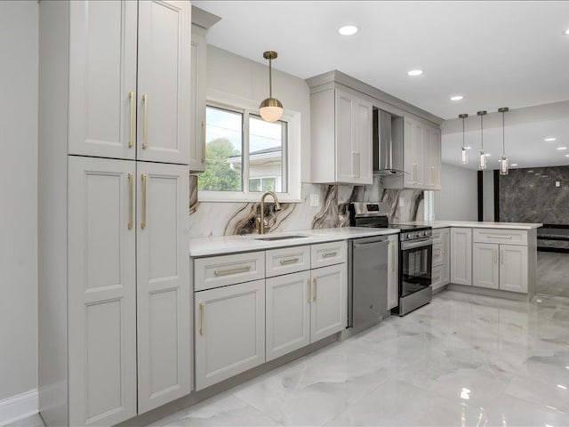 37305 Maas Dr, Sterling Heights, MI 48312 - kitchen featuring a sink, stainless steel appliances, light marble finish flooring, a peninsula, and hanging light fixtures