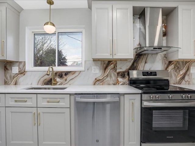 37305 Maas Dr, Sterling Heights, MI 48312 - kitchen featuring stainless steel appliances, wall chimney range hood, a sink, and light countertops