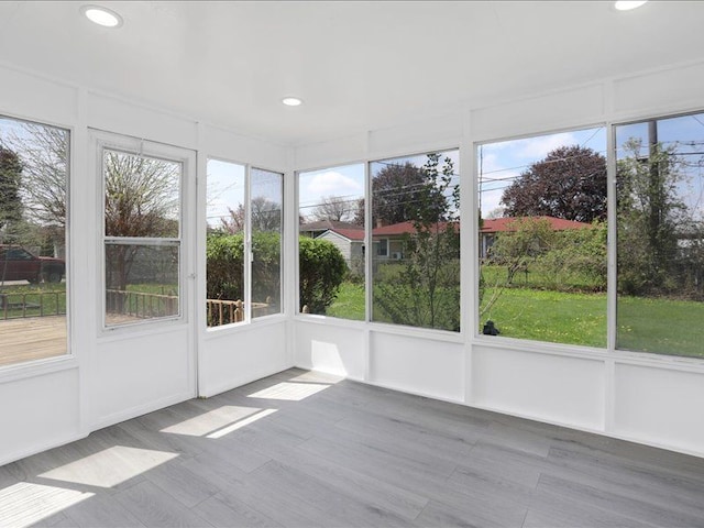 37305 Maas Dr, Sterling Heights, MI 48312 - unfurnished sunroom with recessed lighting, a decorative wall, healthy amount of natural light, and wood finished floors