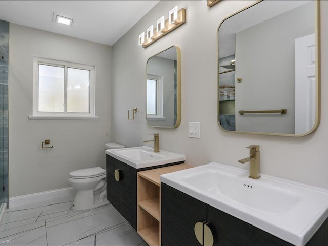 37305 Maas Dr, Sterling Heights, MI 48312 - bathroom featuring toilet, marble look tile flooring, two vanities, a shower with door, and baseboards