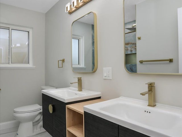37305 Maas Dr, Sterling Heights, MI 48312 - bathroom featuring toilet and two vanities