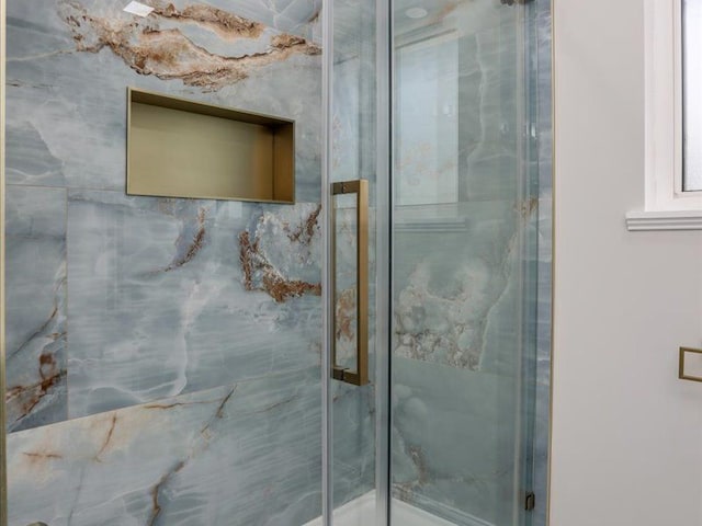 37305 Maas Dr, Sterling Heights, MI 48312 - bathroom featuring a stall shower