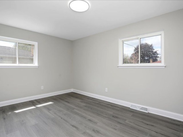 37305 Maas Dr, Sterling Heights, MI 48312 - unfurnished room with dark wood-type flooring and baseboards