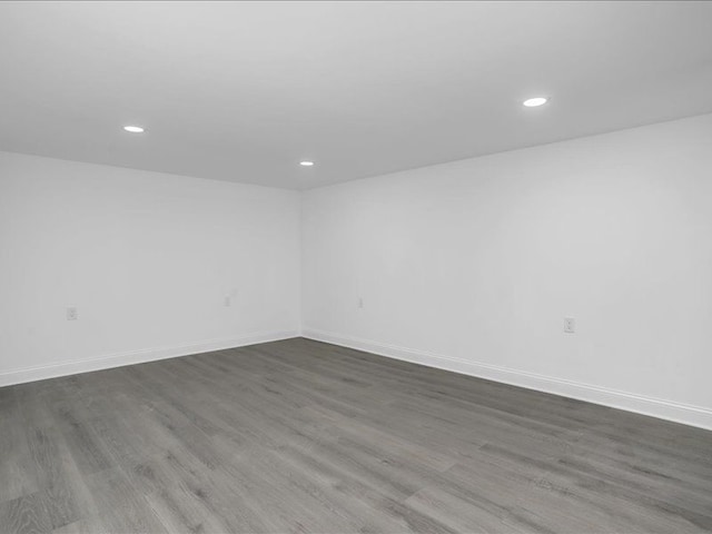 37305 Maas Dr, Sterling Heights, MI 48312 - empty room with recessed lighting, dark wood finished floors, and baseboards