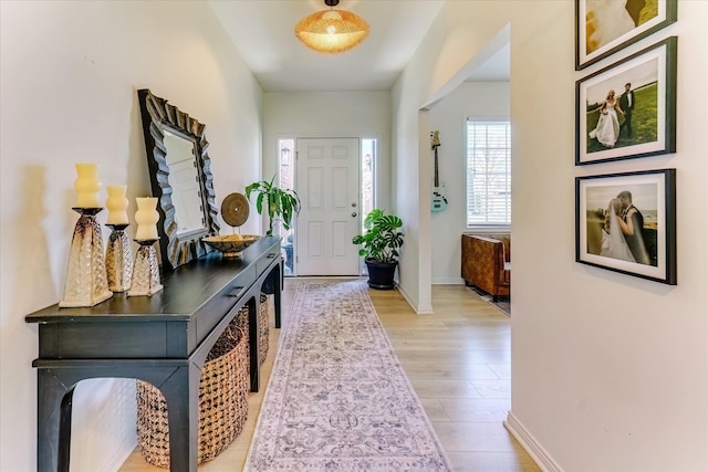 5134 Muirfield Ln, Clarkston, MI 48348 - entryway featuring light wood-style floors and baseboards