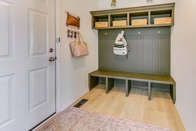 5134 Muirfield Ln, Clarkston, MI 48348 - mudroom featuring wood finished floors and baseboards