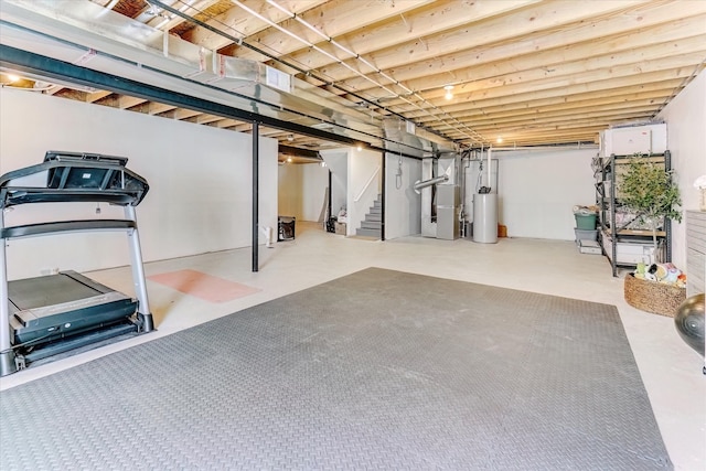 5134 Muirfield Ln, Clarkston, MI 48348 - unfinished basement with gas water heater, stairs, and heating unit