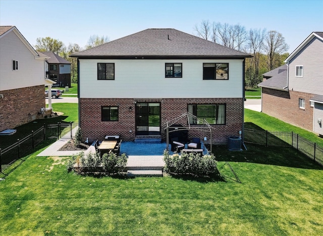 5134 Muirfield Ln, Clarkston, MI 48348 - back of property with a patio area, brick siding, central air condition unit, and a gate