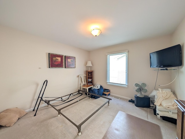 sitting room with carpet flooring and baseboards
