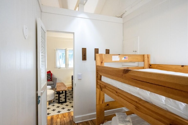 bedroom with wood finished floors