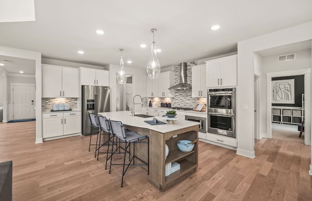 6232 Marsh, Ypsilanti, MI 48197 - kitchen featuring stainless steel appliances, wall chimney range hood, a sink, decorative backsplash, and open shelves