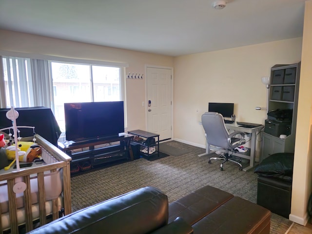 office area featuring carpet flooring and baseboards