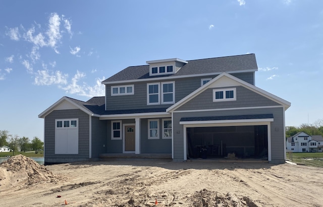 10718 Melanie Dr, Allendale, MI 49401 - view of front of house featuring a garage