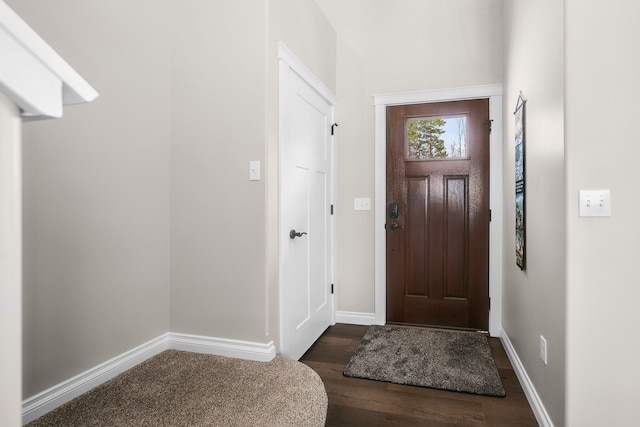 153 Tippi Trl, Buckley, MI 49620 - entrance foyer with dark wood-type flooring and baseboards