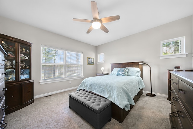 153 Tippi Trl, Buckley, MI 49620 - bedroom featuring baseboards, carpet floors, and a ceiling fan