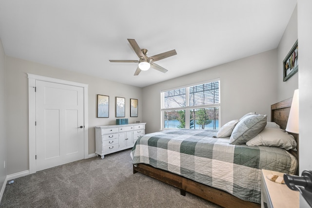 153 Tippi Trl, Buckley, MI 49620 - bedroom with carpet floors, baseboards, and ceiling fan
