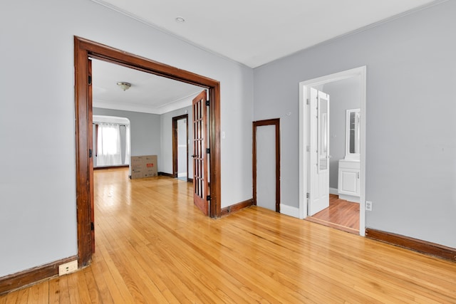 3835 Courville St, Detroit, MI 48224 - hallway with ornamental molding, light wood-style floors, and baseboards