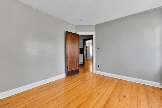 3835 Courville St, Detroit, MI 48224 - unfurnished room featuring light wood-style flooring and baseboards