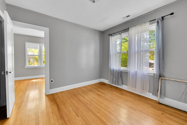 3835 Courville St, Detroit, MI 48224 - unfurnished room featuring light wood finished floors and baseboards