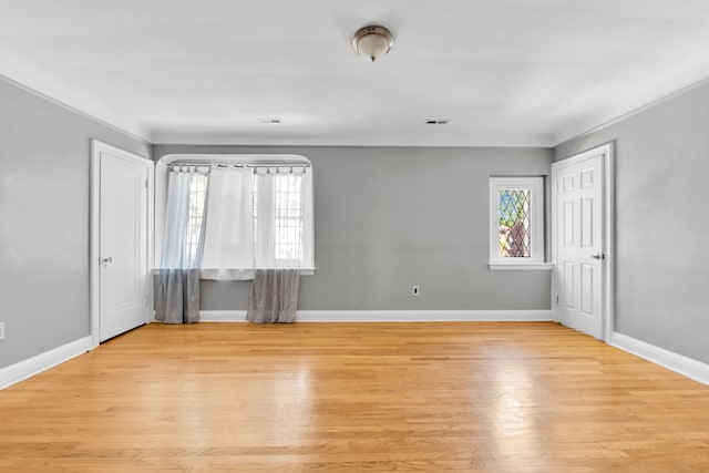 3835 Courville St, Detroit, MI 48224 - empty room with light wood-style flooring and baseboards