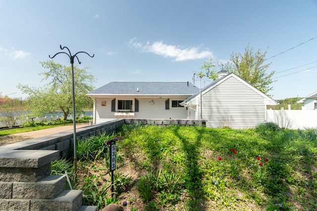 5303 Lake Rd, Reading, MI 49274 - back of house with fence