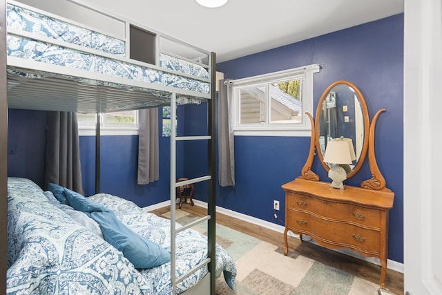 5303 Lake Rd, Reading, MI 49274 - bedroom with wood finished floors and baseboards