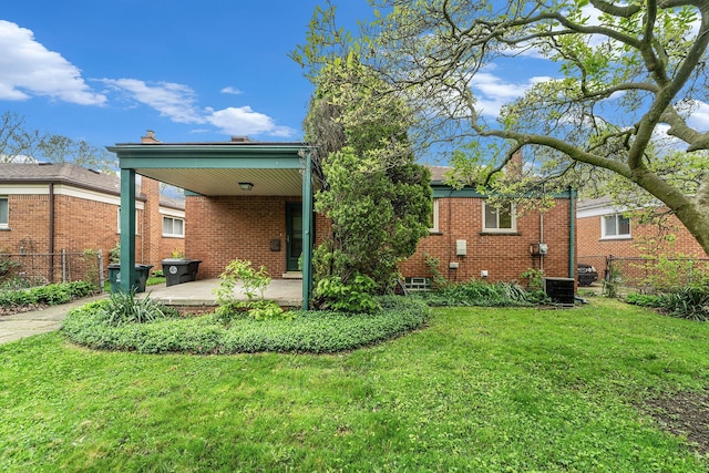 rear view of property featuring brick siding and a porch