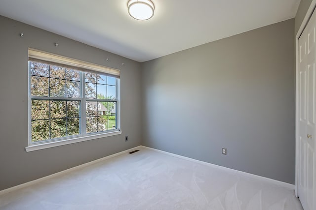 1953 Harley Ct, Ann Arbor, MI 48103 - carpeted empty room featuring baseboards