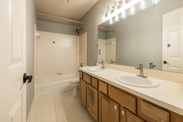1953 Harley Ct, Ann Arbor, MI 48103 - bathroom featuring tile patterned floors, toilet, bathtub / shower combination, and double vanity