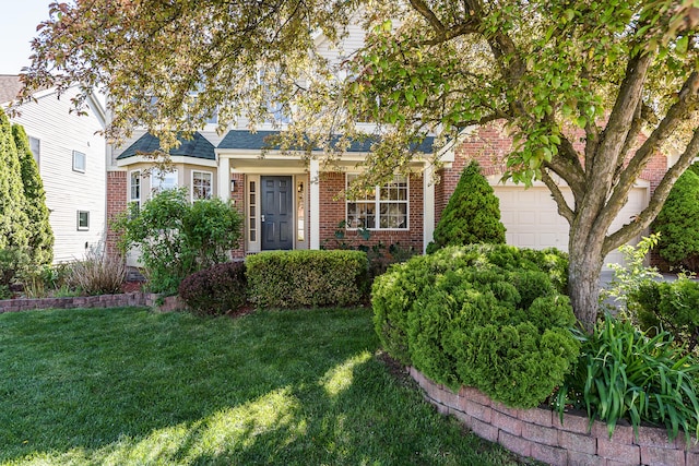 1953 Harley Ct, Ann Arbor, MI 48103 - view of front of house featuring brick siding, a front lawn, and an attached garage