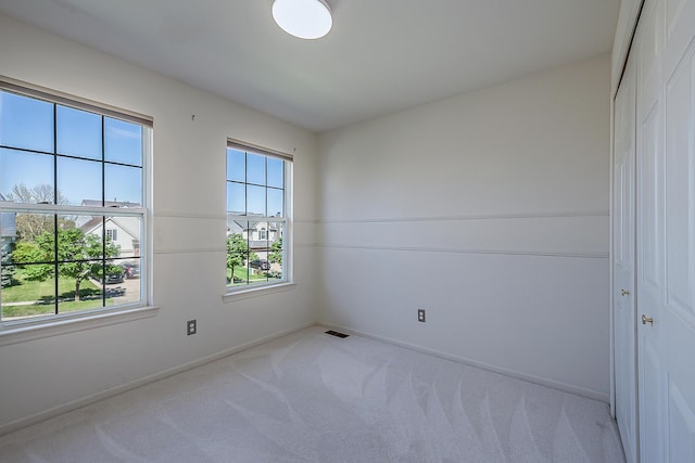 1953 Harley Ct, Ann Arbor, MI 48103 - carpeted empty room featuring baseboards