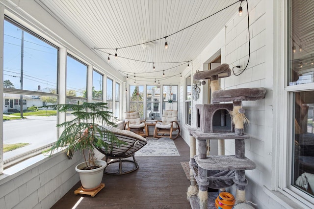 1000 W Ganson St, Jackson, MI 49202 - sunroom with wood finished floors
