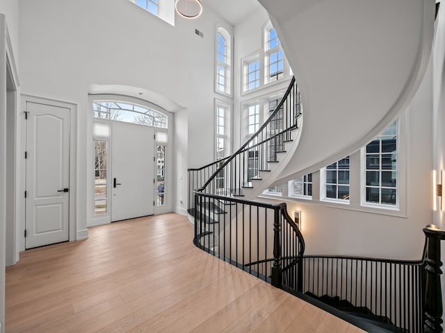 330 Ferndale Ave, Birmingham, MI 48009 - foyer with a towering ceiling, hardwood / wood-style floors, and stairs