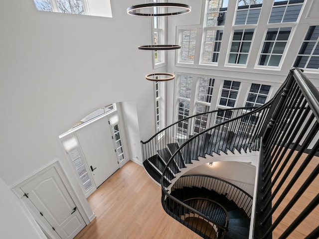 330 Ferndale Ave, Birmingham, MI 48009 - stairs with a high ceiling, wood finished floors, and healthy amount of natural light